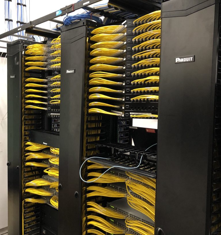 Yellow single-mode fibre patched into ODF racks